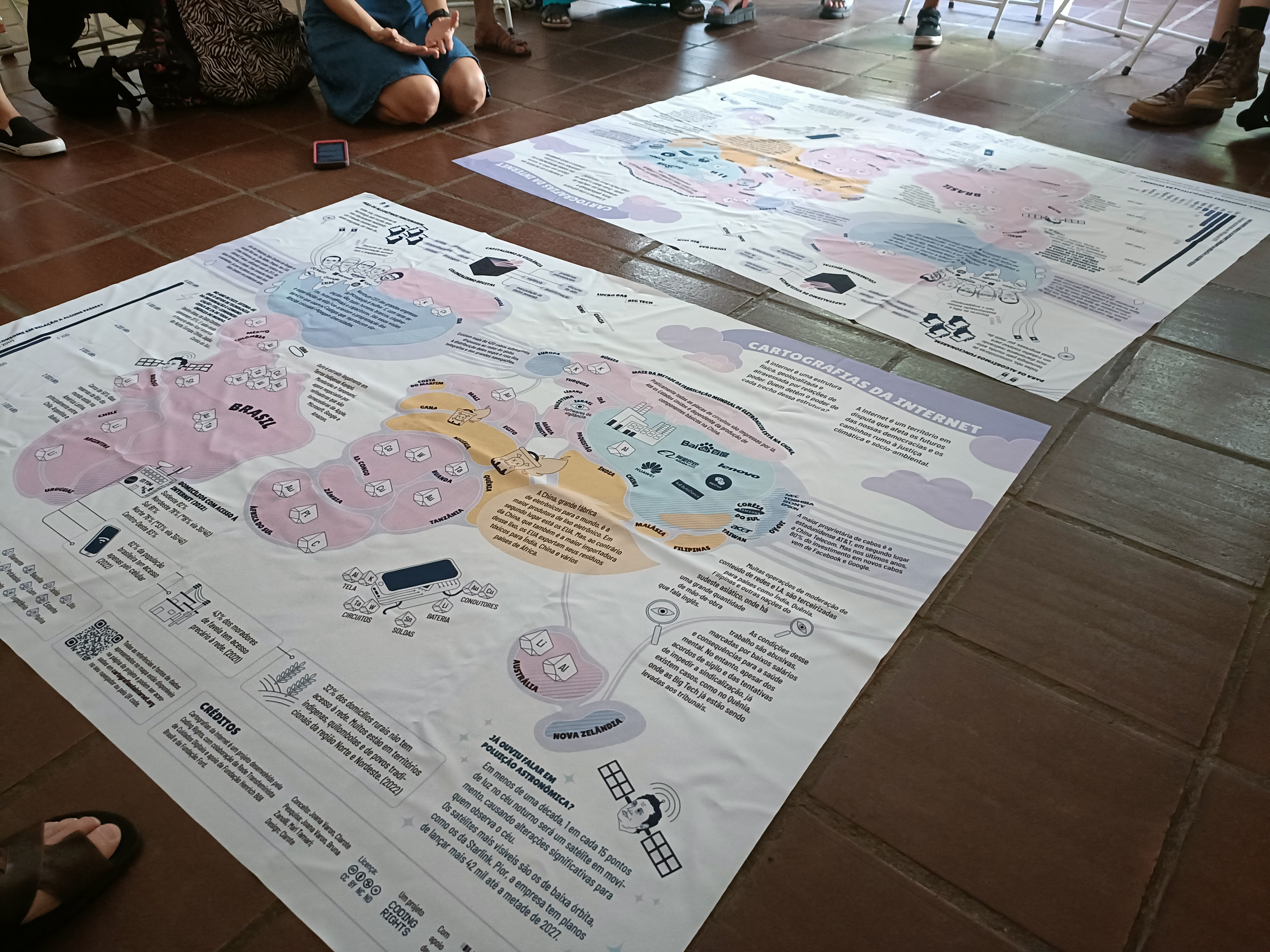 Two Maps of the Internet Territories placed on the floor at the workshop by Coding Rights, Minha Campinas, and Casa Fazenda Roseira. November 11, 2023. Fieldwork photo by Giulia Campaioli.